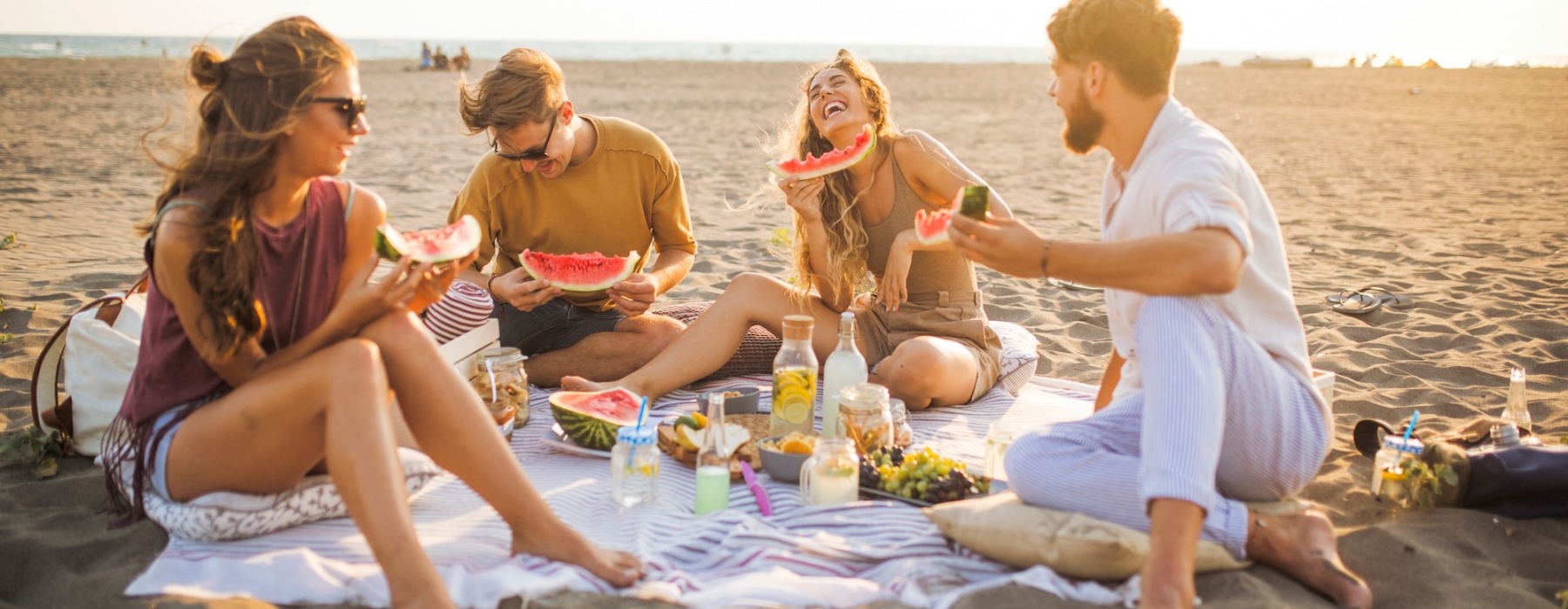 people having a picnic at the beach